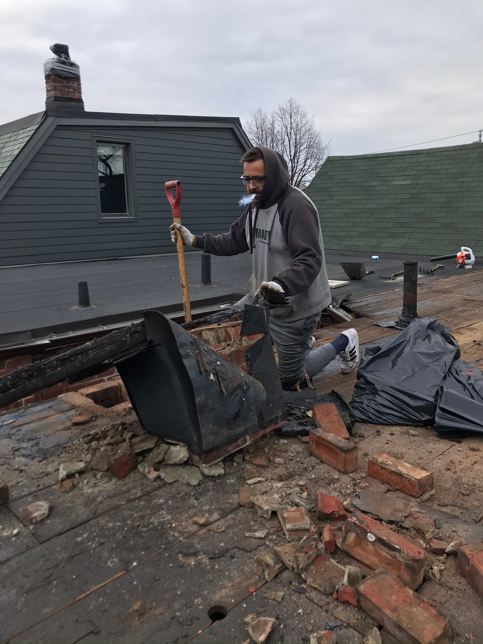 Chimney rebuild and crown rework above roofline