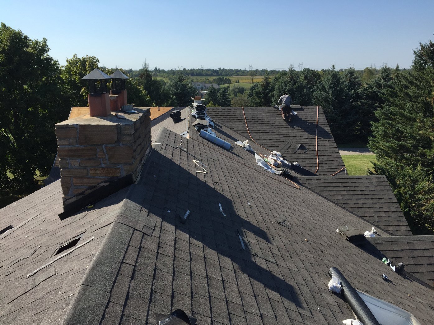 Re-roofing with copper chimney detail